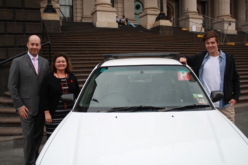 Minister, mother and p plate child at parental campaign launch in Melbourne